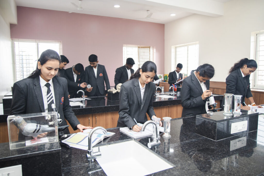 Chate Public School Students performing science project in science lab
